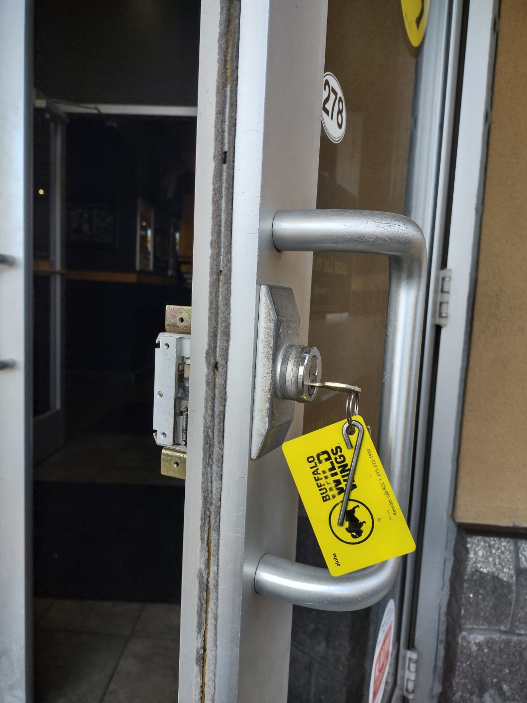 Storefront cylinder re-key with key